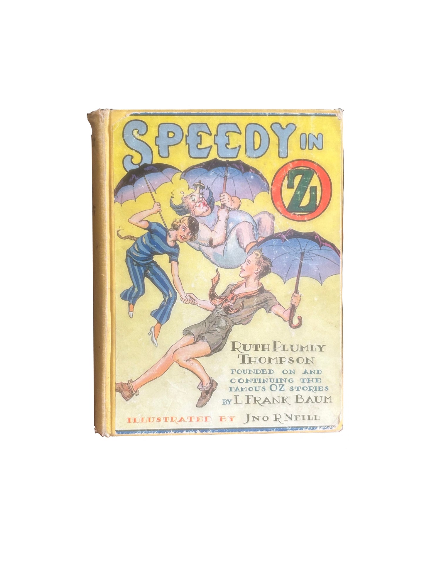 Assortment of Oz books by L. Frank Baum and Ruth Plumly Thompson