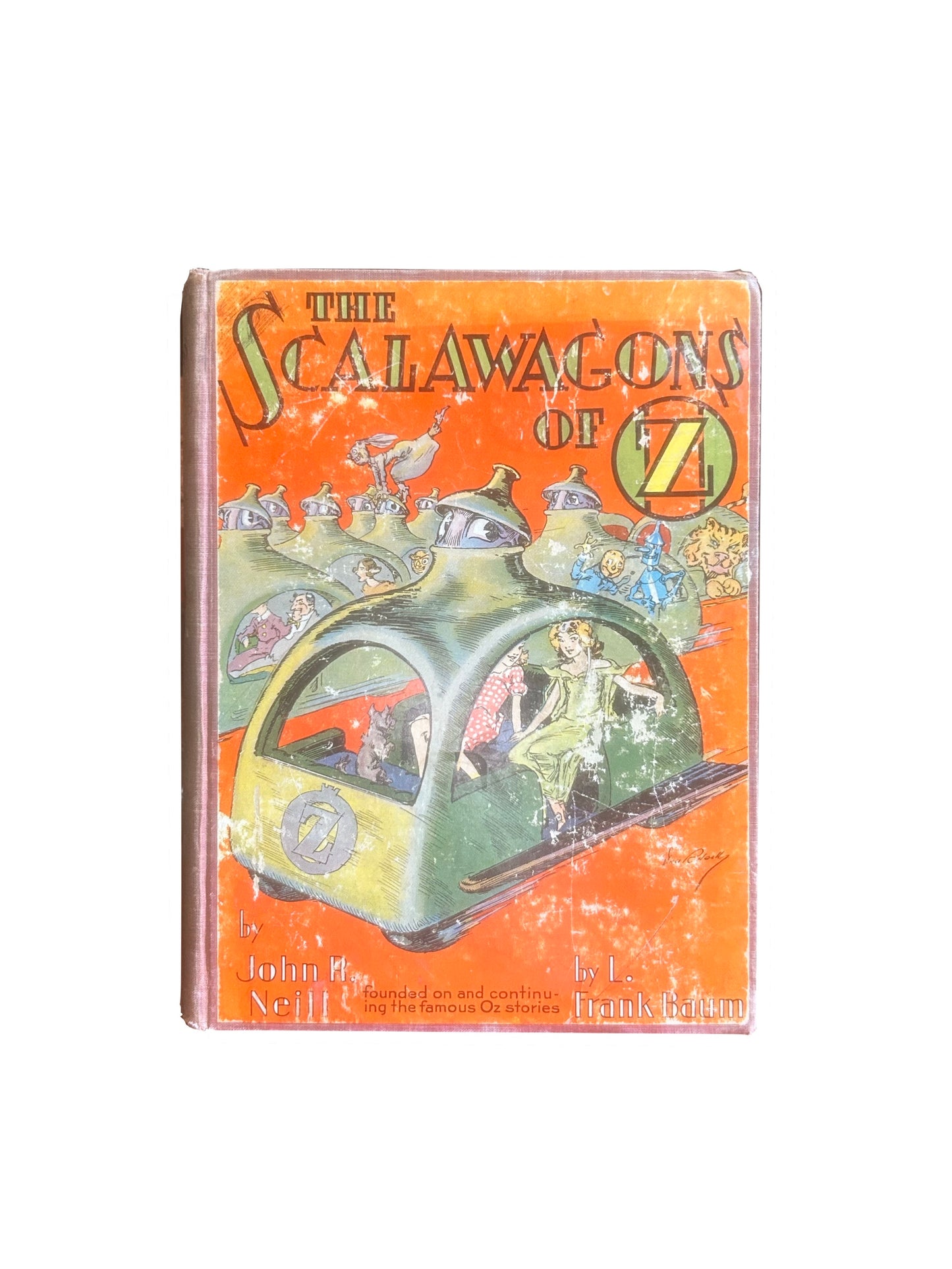 Assortment of Oz books by L. Frank Baum and Ruth Plumly Thompson